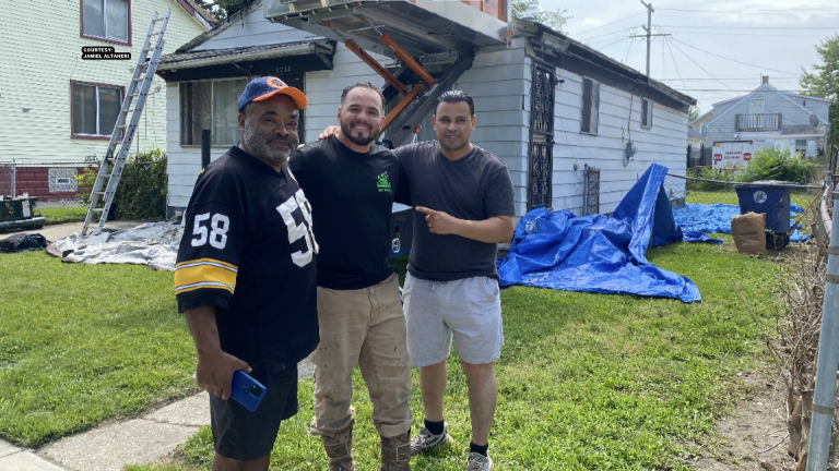 From left to right : Revels ,Ruben Gonzalez from AIS Construction, Hamtramck Police Chief Jamiel Altaheri